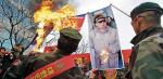 Seul.  Na sobotniej demonstracji przeciw prowokacjom Północy zapłonął portret Kim Dzong Ila
