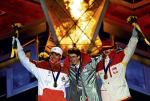 Niedosyt w Salt Lake City: jechał na igrzyska 2002 roku jako faworyt, zdobył brąz  na średniej skoczni (na zdjęciu  z Simonem Ammannem  i Svenem Hannawaldem)  i srebro na dużej 