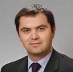 Tomasz Ochrymowicz, Deloitte