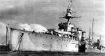Krążownik ORP „Dragon”, ciężko uszkodzony przez niemiecką żywą torpedę u wybrzeży Normandii 8 lipca  1944 r. Wrak wykorzystano jako falochron alianckiego sztucznego portu Mulberry