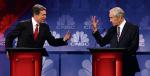 Podczas debaty w telewizji CNBC Rick Perry  (z lewej) usiłował przekonać Rona Paula, że wie, jak ograniczyć deficyt       