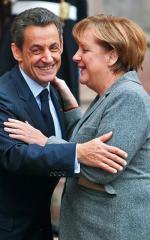Nicolas Sarkozy  i Angela Merkel  po spotkaniu w Strasburgu