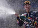 Sebastian Vettel  cieszy się  z pierwszego zwycięstwa przed własną publicznością 