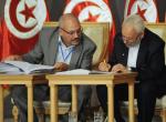 Tunis. Raszid Ganuszi, przywódca islamistycznej partii Nahda, podpisuje porozumienie z opozycją