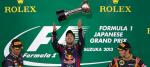 Sebastian Vettel na podium w Japonii: to już jego dziewiąte zwycięstwo w tym sezonie, piąte z rzędu
