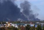 Kłęby dymu nad rejonem donieckiego lotniska, gdzie w ciągu dwóch dni toczyły się walki