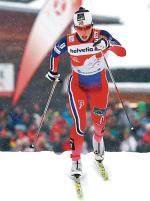 Marit Bjoergen biegnie po pierwszy triumf w Tour de Ski. Fot. Karl-Josef Hildenbrand 