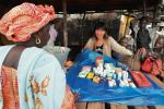 Żeń-szeń dobry na wszystko  – na rynku miasteczka Kamsar  w Gwinei 