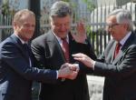 Donald Tusk, Petro Poroszenko i Jean-Claude Juncker w dobrych humorach przed rozpoczęciem rozmów w Kijowie