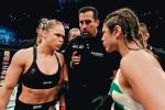 Ronda Rousey (z lewej), kobieta, która zarobiła miliony dolarów  na tym, że po mistrzowsku  i z wdziękiem umie się bić