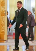 Ramzan Kadyrow (na zdjęciu: wizyta na Kremlu we wrześniu 2014 r.) wysyła rosyjskich opozycjonistów do psychuszki i jednocześnie deklaruje wierność Władimirowi Putinowi