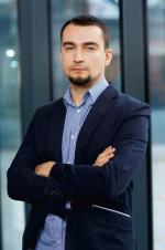 Maciej Wolny, menedżer w dziale doradztwa finansowego Deloitte