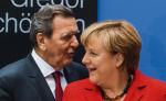 Eks kanclerz i kanclerz, czyli Gerhard Schroeder i Angela Merkel. Czy ktoś zada im kiedyś pytanie „Coście uczynili z tą krainą?”