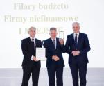 Prezes PGNiG  Piotr Woźniak nagrodę Filar Budżetu odebrał  z rąk wicepremiera Jarosława Gowina  oraz  prezesa GBC Dariusza Bąka.