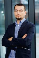 Maciej Wolny, menedżer w dziale doradztwa finansowego Deloitte