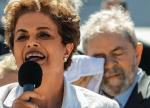 Prezydent Brazylii Rousseff wyraźnie potrzebuje makijażu politycznego. Z tyłu jej poprzednik, Luiz Inacio Lula da Silva: nie tak planował rządy swojej formacji. Fot. Antonio Lacerda