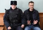 Bloger i działacz polityczny Aleksiej Nawalny przed przesłuchaniem w sądzie apelacyjnym w Moskwie. Nawalny został aresztowany podczas antykorupcyjnych protestów 27 marca. Skazano go na 15 dni więzienia pod zarzutem stawiania oporu.