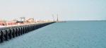 6 Nowy Port w Ad-Dausze, stolicy Kataru, jest obecnie największym tego typu portem na Bliskim Wschodzie. Zajmuje powierzchnię 26 kilometrów kwadratowych, a łączny koszt budowy szacowany jest na 7,4 miliarda dolarów. Po ukończeniu będzie w stanie przeładować rocznie 7,5 miliona kontenerów. Głównym wykonawcą został China Harbour Engineering. Zdjęcie przedstawia pierwszą fazę projektu.