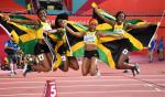 Złota sztafeta Jamajki 4x100 m. Na pierwszym planie Shelly-Ann Frazer-Pryce, najszybsza kobieta świata
