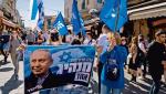 Premier Netanjahu  na wyborczych plakatach swych zwolenników.  23 marca  w Izraelu znów będą wybory,  w które – chcąc nie chcąc  – angażuje się Dania i Austria 