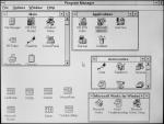 Ekran monochromatycznego laptopa Toshiba T2100 z 1995 r. z systemem Microsoft Windows 3.11