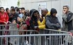 Bruksela, 29 sierpnia: kolejka przed urzędem przyjmującym wnioski o azyl