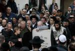 Pogrzeb Eliego Mizrahiego i jego żony Natalie, ofiar piątkowego ataku terrorystycznego pod synagogą we wschodniej Jerozolimie