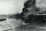 Płonące Westerplatte ostrzeliwane z pokładu pancernika „Schleswig–Holstein” 