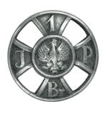 Odznaka I Brygady zwana Odznaką „Za wierną służbę” zaprojektowana przez Wojciecha Jastrzębowskiego (1884 – 1963), żołnierza Legionów, i nadana po raz pierwszy w drugą rocznicę wymarszu Pierwszej Kadrowej 