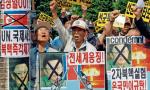 Demonstranci w Seulu domagali się od świata potępienia państwa Kim Dzong Ila (fot: Lee Jin-man)