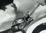 Strzelec w górnej wieżyczce brytyjskiego bombowca, wrzesień 1940 r. 