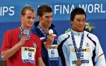 Medaliści, od lewej: Paweł Korzeniowski, Michael Phelps i Takeshi Matsuda 