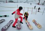 Lekcja snowboardu na Górce Szczęśliwickiej. Bal dla dzieci w Hali Arena na Ursynowie