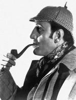 Sherlock Holmes z nieodłączną fajką – kadr z filmu z 1939 roku