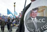 Koszulki  z podobizną Wiktora Janukowycza sprzedają się  jak świeże bułeczki