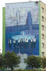 Gdańsk – Zaspa. Europejski Festiwal Malarstwa Monumentalnego. Mural „Dywizjon 303”,  21 m wysokości. Autorzy: Justyna Dziechciarska (gdańska ASP) z 5-osobowym zespołem