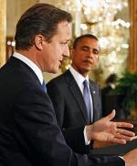 David Cameron podczas wizyty w Ameryce (na zdjęciu z Barackiem Obamą) nie popisał się wiedzą historyczną / fot: Kevin Lamarque