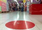 Czerwona kropka w Carrefour – symbol ucisku pracowników  w prywatnych firmach