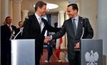 Dobry klimat do załatwienia sprawy statusu polskiej mniejszości stworzyła twarda postawa ministra Radosława Sikorskiego (na zdjęciu w październiku 2009 r. w Warszawie z Guido Westerwellem) – uważa Marek Wójcicki, prezes Związku Polaków w Niemczech Rodło