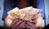 Na koniec roku euro może kosztować tylko 1,24 dolara