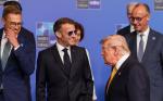 Donald Trump (na zdjęciu z prezydentem Francji Emmanuelem Macronem) jeszcze przed wyjazdem do Ankary sugerował, że nie przyjechałby na szczyt NATO, gdyby nie odbywał się w Turcji